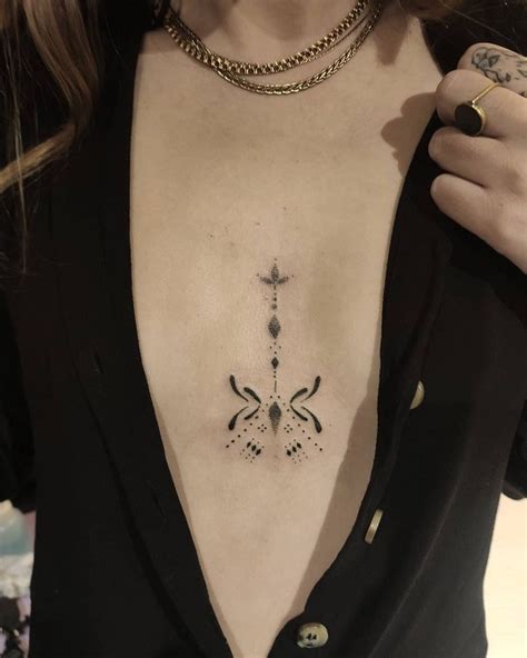 between boob tattoo ideas|27 Between breast tattoo ideas 